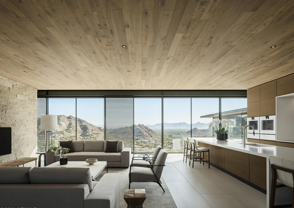 4301 E Upper Ridge Way Home in Paradise Valley, Arizona. Perched between two mountain peaks, the Upper Ridge Residence is an 8,000+ sf modern marvel designed by The Construction Zone. Featuring panoramic Valley of the Sun views, this steel and glass pavilion offers the highest level of craftsmanship.
