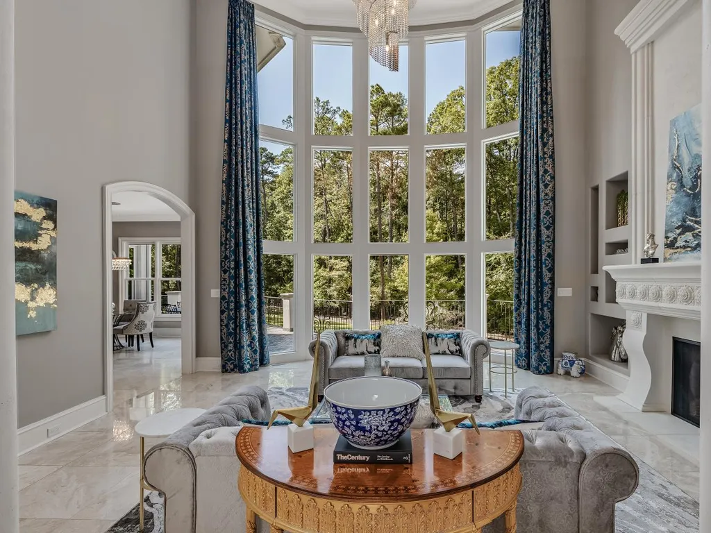 53 Topaz Jewel Court Home in Durham, North Carolina. Step into an extraordinary opportunity to own an ultra-luxury home in a coveted, fully fenced, and gated community, nestled within 5+ pristine acres. This magnificent estate represents the epitome of elegance and sophistication, boasting superior craftsmanship and unparalleled attention to detail at every turn.