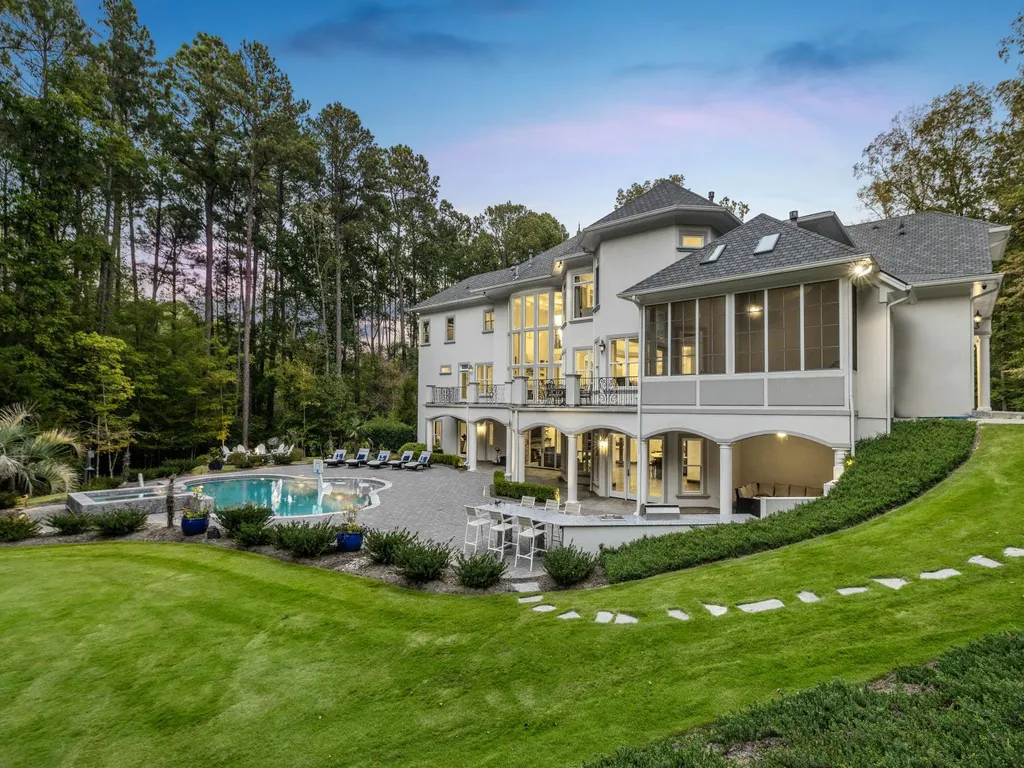 53 Topaz Jewel Court Home in Durham, North Carolina. Step into an extraordinary opportunity to own an ultra-luxury home in a coveted, fully fenced, and gated community, nestled within 5+ pristine acres. This magnificent estate represents the epitome of elegance and sophistication, boasting superior craftsmanship and unparalleled attention to detail at every turn.