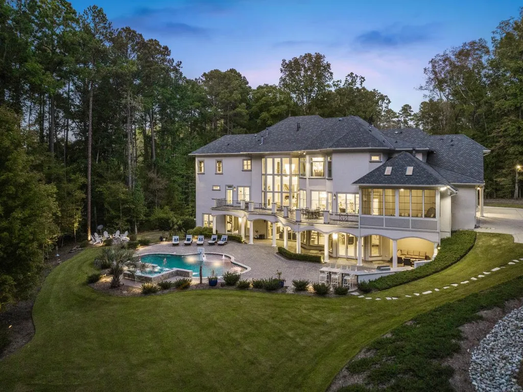 53 Topaz Jewel Court Home in Durham, North Carolina. Step into an extraordinary opportunity to own an ultra-luxury home in a coveted, fully fenced, and gated community, nestled within 5+ pristine acres. This magnificent estate represents the epitome of elegance and sophistication, boasting superior craftsmanship and unparalleled attention to detail at every turn.