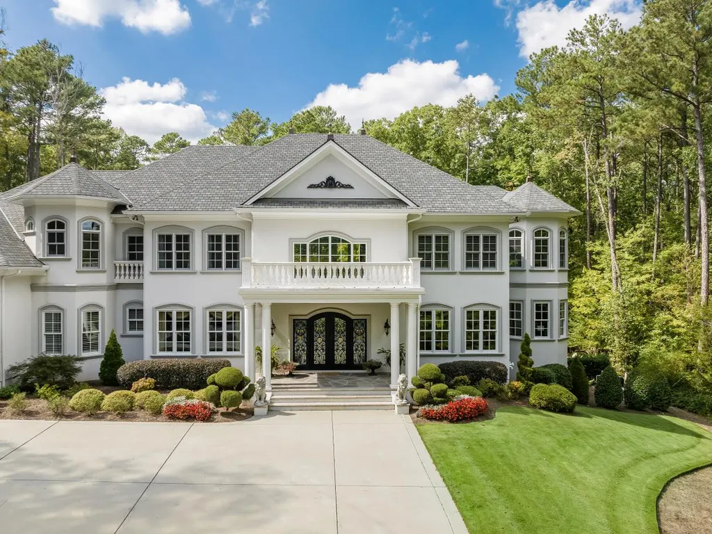 53 Topaz Jewel Court Home in Durham, North Carolina. Step into an extraordinary opportunity to own an ultra-luxury home in a coveted, fully fenced, and gated community, nestled within 5+ pristine acres. This magnificent estate represents the epitome of elegance and sophistication, boasting superior craftsmanship and unparalleled attention to detail at every turn.