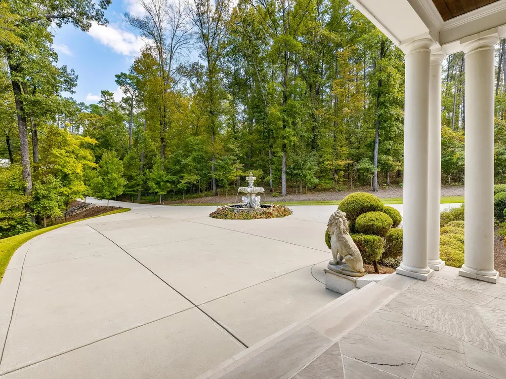 53 Topaz Jewel Court Home in Durham, North Carolina. Step into an extraordinary opportunity to own an ultra-luxury home in a coveted, fully fenced, and gated community, nestled within 5+ pristine acres. This magnificent estate represents the epitome of elegance and sophistication, boasting superior craftsmanship and unparalleled attention to detail at every turn.