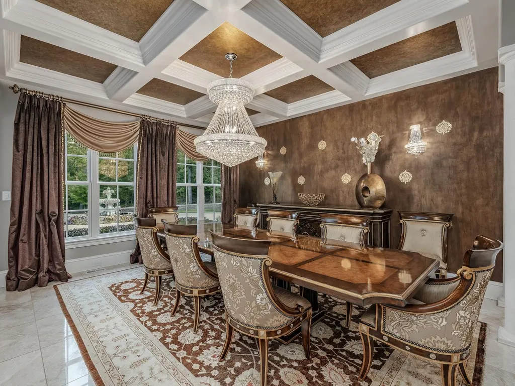 53 Topaz Jewel Court Home in Durham, North Carolina. Step into an extraordinary opportunity to own an ultra-luxury home in a coveted, fully fenced, and gated community, nestled within 5+ pristine acres. This magnificent estate represents the epitome of elegance and sophistication, boasting superior craftsmanship and unparalleled attention to detail at every turn.