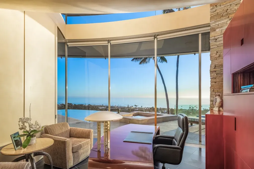 5740 La Jolla Corona Drive Home in La Jolla, California. Discover SEAVIEW, a stunning 5-bedroom architectural marvel in San Diego that offers an extraordinary 260-degree panorama of the ocean. This 8,810 sq ft estate, designed by Island Architects and constructed by Wardell Builders, exudes opulence with its saltwater infinity pool, fresh-water ponds, and lavish interiors. 