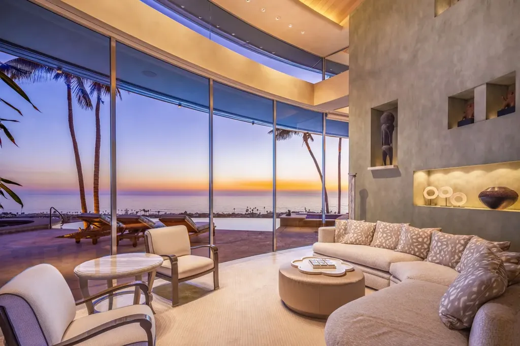 5740 La Jolla Corona Drive Home in La Jolla, California. Discover SEAVIEW, a stunning 5-bedroom architectural marvel in San Diego that offers an extraordinary 260-degree panorama of the ocean. This 8,810 sq ft estate, designed by Island Architects and constructed by Wardell Builders, exudes opulence with its saltwater infinity pool, fresh-water ponds, and lavish interiors. 