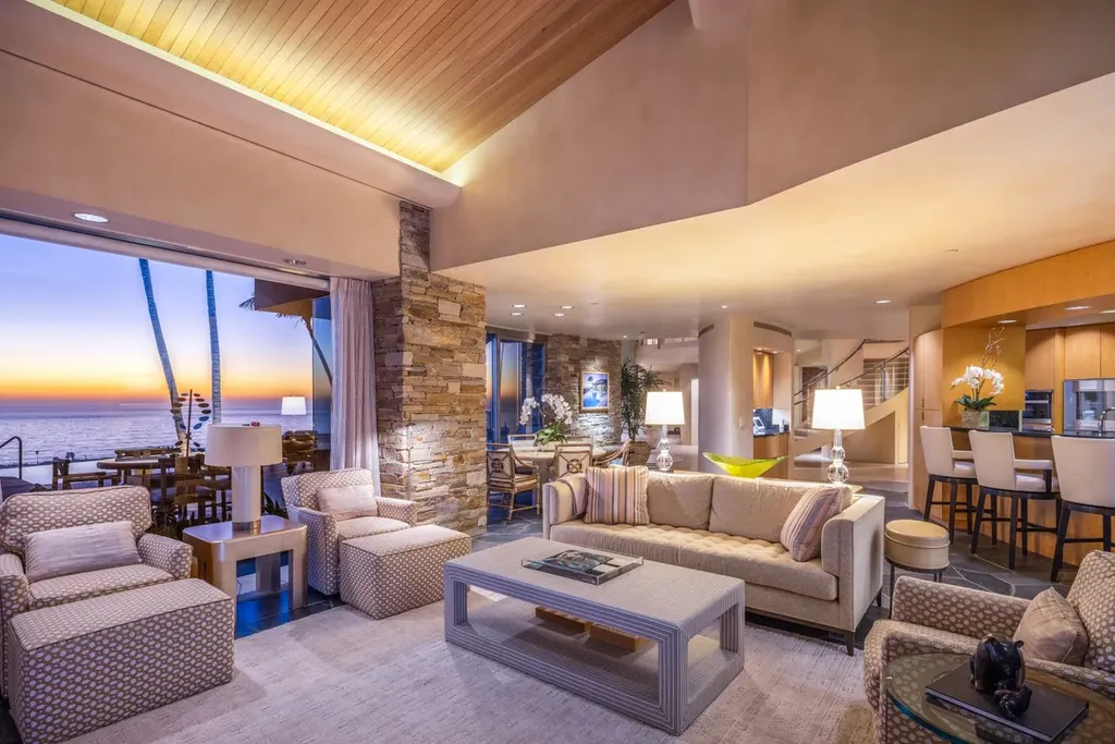 5740 La Jolla Corona Drive Home in La Jolla, California. Discover SEAVIEW, a stunning 5-bedroom architectural marvel in San Diego that offers an extraordinary 260-degree panorama of the ocean. This 8,810 sq ft estate, designed by Island Architects and constructed by Wardell Builders, exudes opulence with its saltwater infinity pool, fresh-water ponds, and lavish interiors. 
