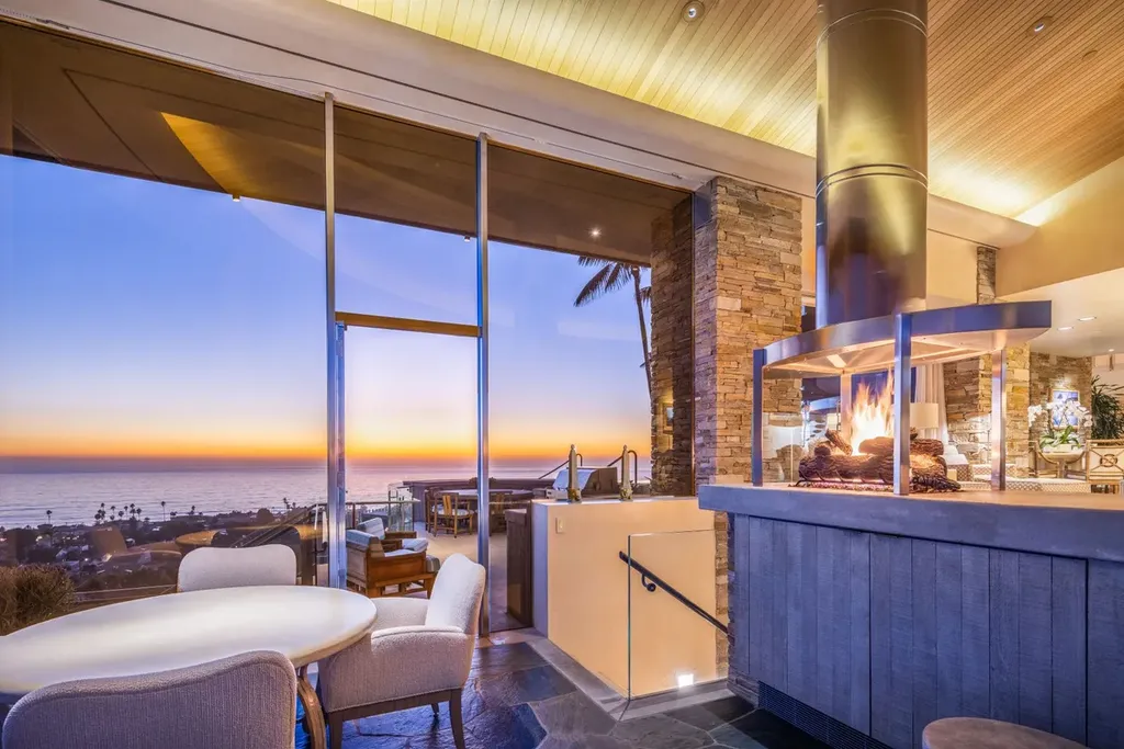 5740 La Jolla Corona Drive Home in La Jolla, California. Discover SEAVIEW, a stunning 5-bedroom architectural marvel in San Diego that offers an extraordinary 260-degree panorama of the ocean. This 8,810 sq ft estate, designed by Island Architects and constructed by Wardell Builders, exudes opulence with its saltwater infinity pool, fresh-water ponds, and lavish interiors. 