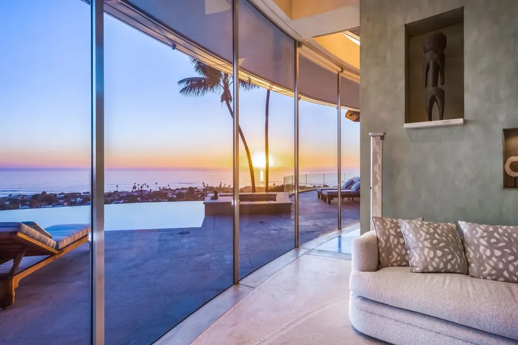 5740 La Jolla Corona Drive Home in La Jolla, California. Discover SEAVIEW, a stunning 5-bedroom architectural marvel in San Diego that offers an extraordinary 260-degree panorama of the ocean. This 8,810 sq ft estate, designed by Island Architects and constructed by Wardell Builders, exudes opulence with its saltwater infinity pool, fresh-water ponds, and lavish interiors. 