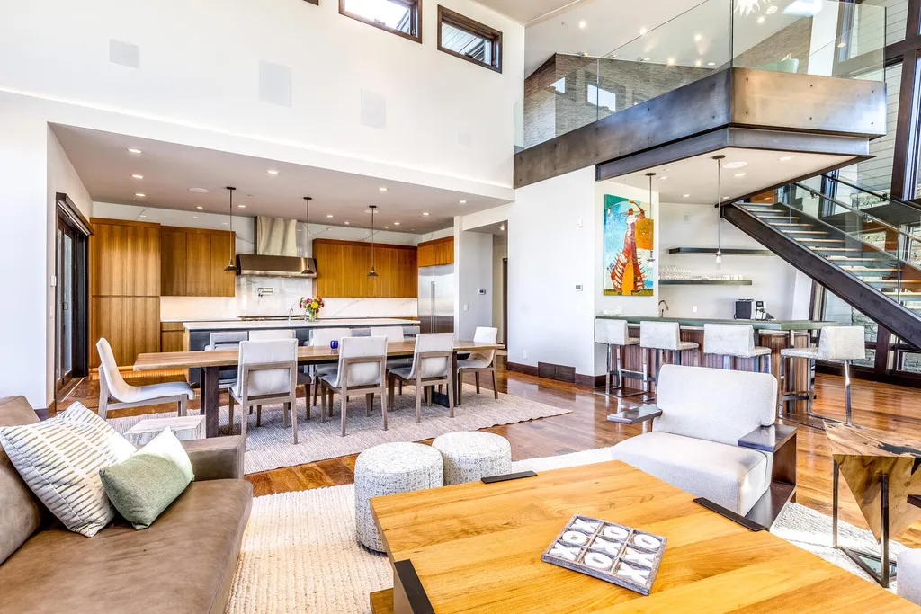 7235 North Starlight Circle Home in Kamas, Utah. Experience ultimate luxury living in this exceptional 5-bedroom, 5 ½-bathroom masterpiece spanning 6,270 square feet. Embrace the outdoors with folding glass doors leading to a heated patio, infinity spa pool, and landscaped yard with stunning Deer Valley and Jordanelle Reservoir views.