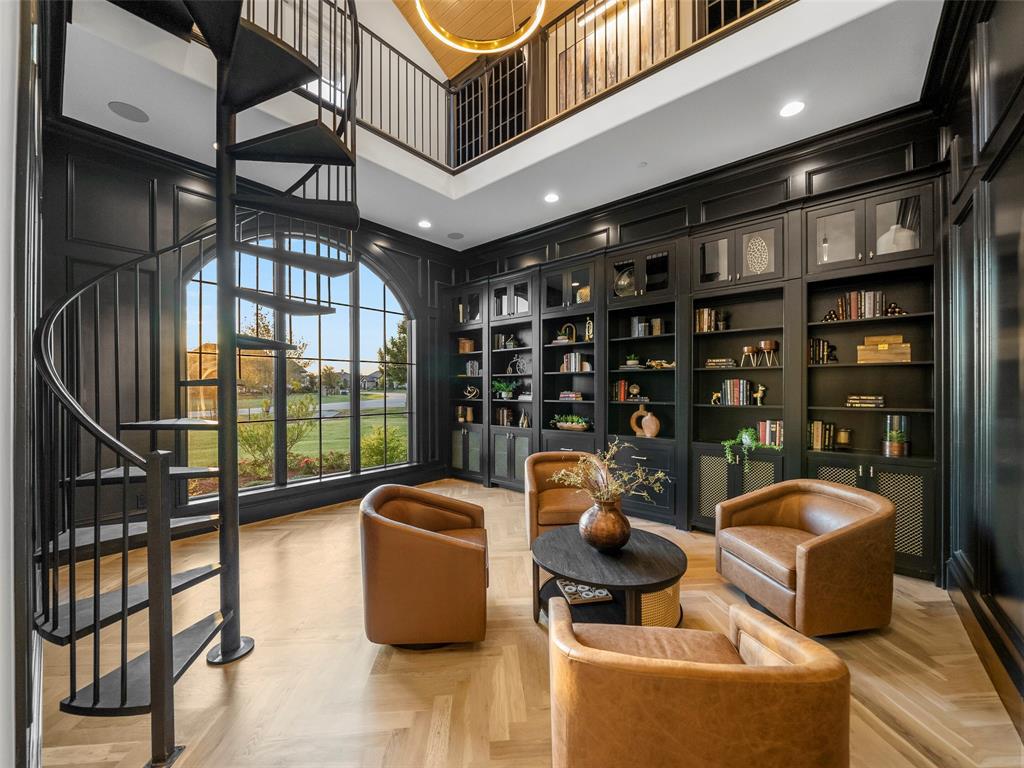 892 Ethel Marie Drive Home in Fairview, Texas. Discover the epitome of luxury living in this stunning Homes By J. Anthony masterpiece, boasting over 7,800 sq ft in Fairview's prestigious Chamberlain Place subdivision. This meticulously updated one-story design offers an array of features, including a gourmet kitchen, wine bar, spacious bedrooms, and a pool overlooking an outdoor dining area.