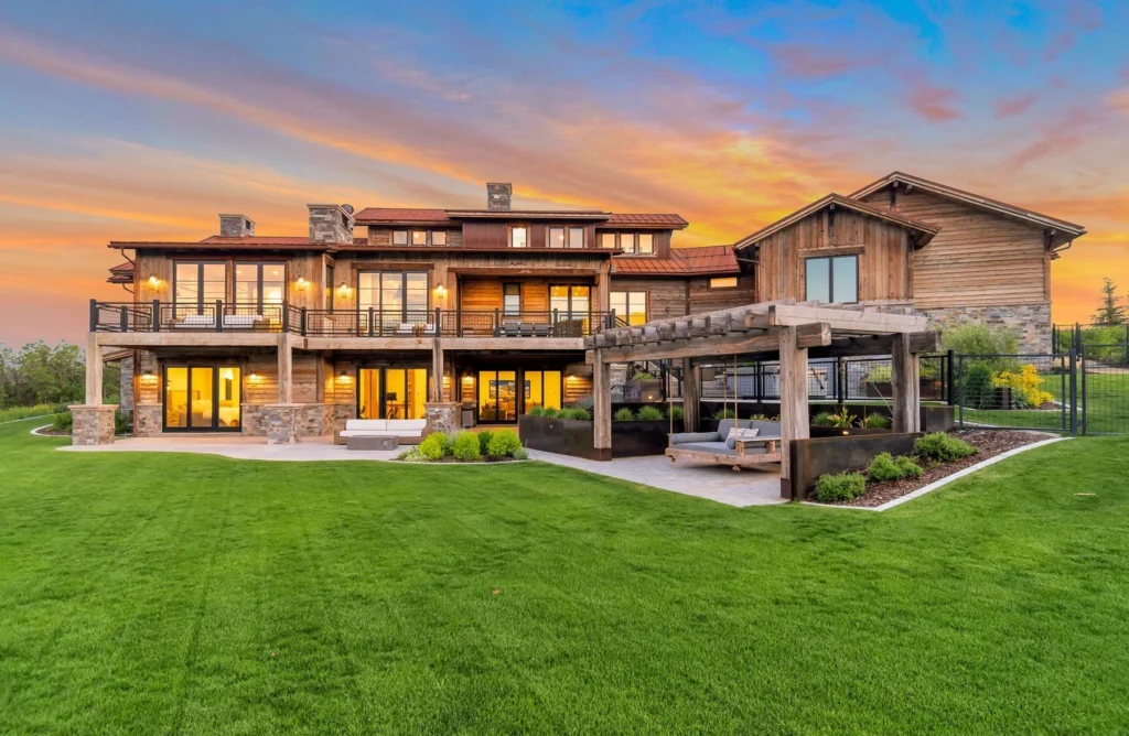 977 West Deer Hill Home in Park City, Utah. Discover opulent mountain living in this 4-bedroom, 6,103 sq ft modern home in Park City's exclusive Preserve community. With stunning views, spacious living areas, and exceptional features like radiant heat, a backup generator, and proximity to outdoor trails, this retreat offers unparalleled luxury and tranquility.