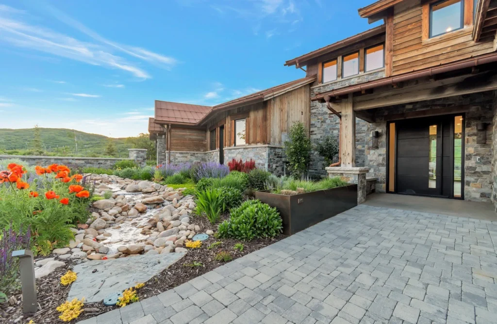 977 West Deer Hill Home in Park City, Utah. Discover opulent mountain living in this 4-bedroom, 6,103 sq ft modern home in Park City's exclusive Preserve community. With stunning views, spacious living areas, and exceptional features like radiant heat, a backup generator, and proximity to outdoor trails, this retreat offers unparalleled luxury and tranquility.