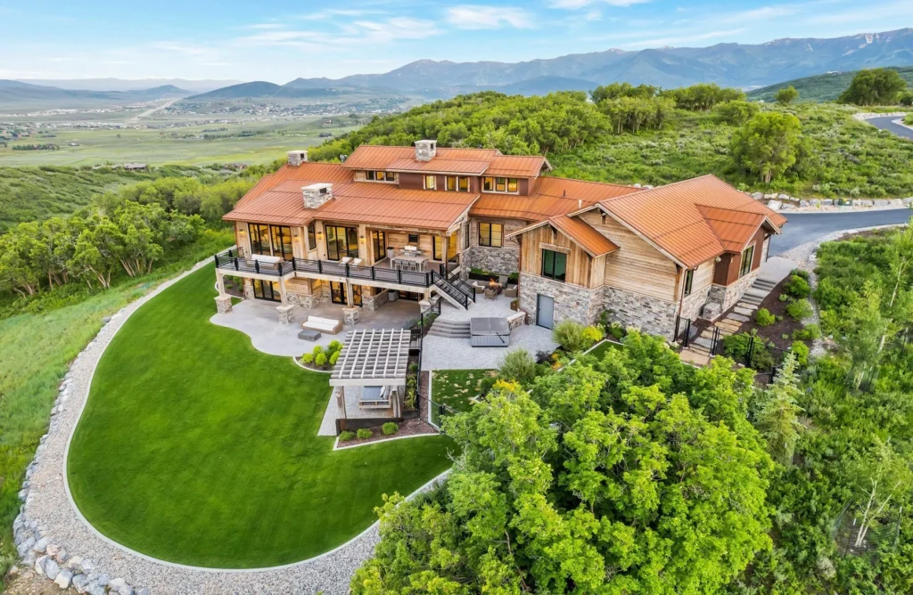 977 West Deer Hill Home in Park City, Utah. Discover opulent mountain living in this 4-bedroom, 6,103 sq ft modern home in Park City's exclusive Preserve community. With stunning views, spacious living areas, and exceptional features like radiant heat, a backup generator, and proximity to outdoor trails, this retreat offers unparalleled luxury and tranquility.