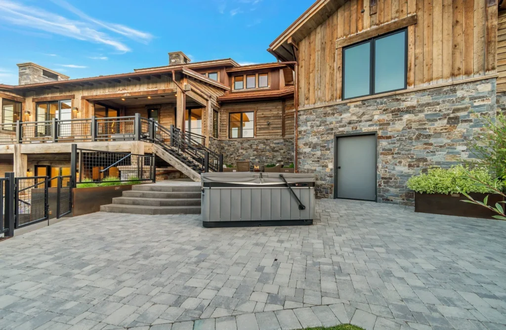 977 West Deer Hill Home in Park City, Utah. Discover opulent mountain living in this 4-bedroom, 6,103 sq ft modern home in Park City's exclusive Preserve community. With stunning views, spacious living areas, and exceptional features like radiant heat, a backup generator, and proximity to outdoor trails, this retreat offers unparalleled luxury and tranquility.