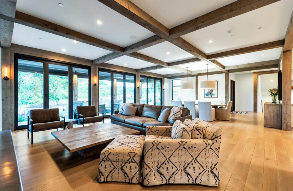 977 West Deer Hill Home in Park City, Utah. Discover opulent mountain living in this 4-bedroom, 6,103 sq ft modern home in Park City's exclusive Preserve community. With stunning views, spacious living areas, and exceptional features like radiant heat, a backup generator, and proximity to outdoor trails, this retreat offers unparalleled luxury and tranquility.