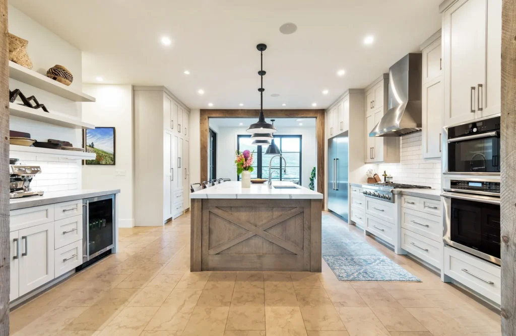 977 West Deer Hill Home in Park City, Utah. Discover opulent mountain living in this 4-bedroom, 6,103 sq ft modern home in Park City's exclusive Preserve community. With stunning views, spacious living areas, and exceptional features like radiant heat, a backup generator, and proximity to outdoor trails, this retreat offers unparalleled luxury and tranquility.
