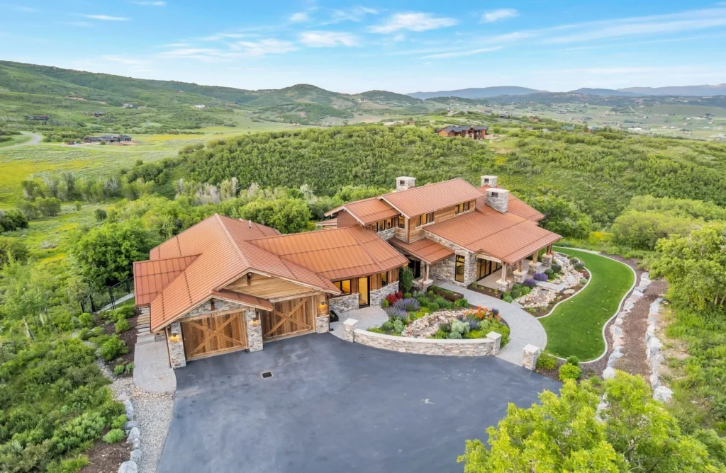 977 West Deer Hill Home in Park City, Utah. Discover opulent mountain living in this 4-bedroom, 6,103 sq ft modern home in Park City's exclusive Preserve community. With stunning views, spacious living areas, and exceptional features like radiant heat, a backup generator, and proximity to outdoor trails, this retreat offers unparalleled luxury and tranquility.