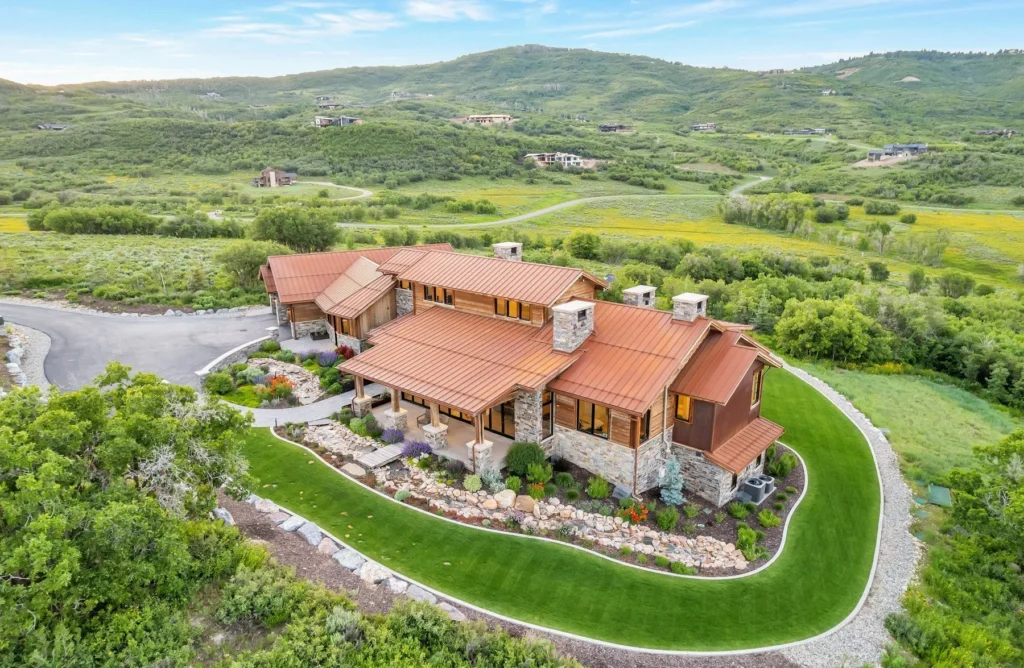 977 West Deer Hill Home in Park City, Utah. Discover opulent mountain living in this 4-bedroom, 6,103 sq ft modern home in Park City's exclusive Preserve community. With stunning views, spacious living areas, and exceptional features like radiant heat, a backup generator, and proximity to outdoor trails, this retreat offers unparalleled luxury and tranquility.
