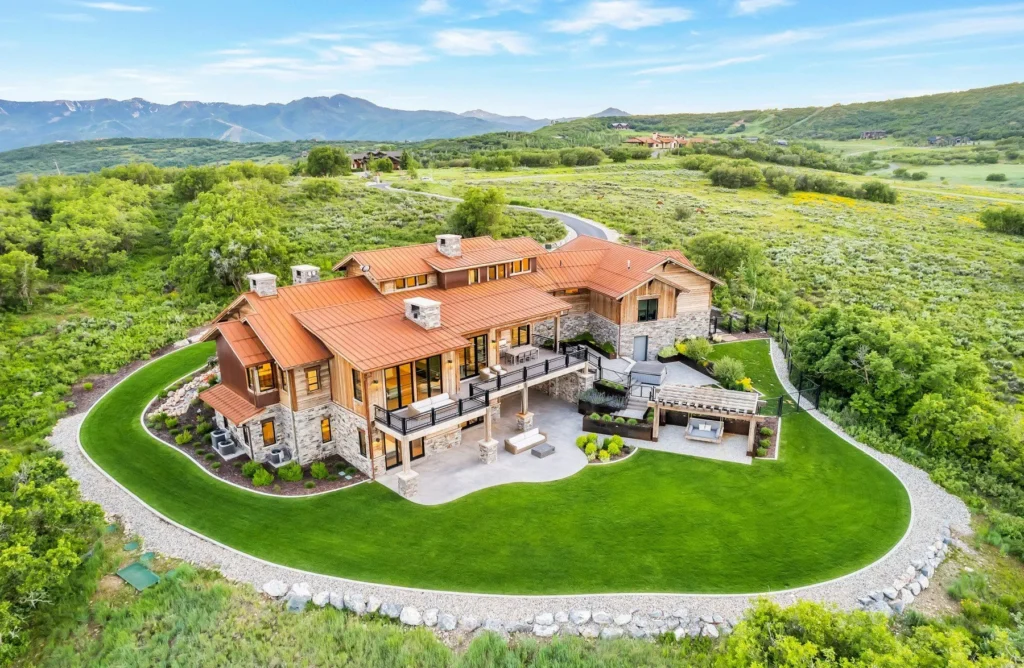 977 West Deer Hill Home in Park City, Utah. Discover opulent mountain living in this 4-bedroom, 6,103 sq ft modern home in Park City's exclusive Preserve community. With stunning views, spacious living areas, and exceptional features like radiant heat, a backup generator, and proximity to outdoor trails, this retreat offers unparalleled luxury and tranquility.
