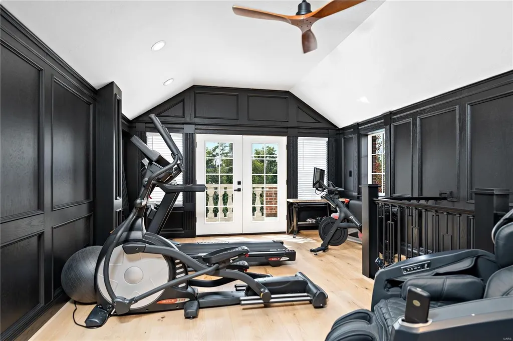 9948 Litzsinger Road Home in Saint Louis, Missouri. Step into the timeless charm of Galloway Manor, a beautifully renovated Tudor estate that seamlessly blends historic character with modern luxury. Enjoy stunning entertaining spaces, a designer kitchen, a courtyard terrace overlooking the pool and tennis court, a main floor primary suite with a showstopping walk-in closet, and much more. 
