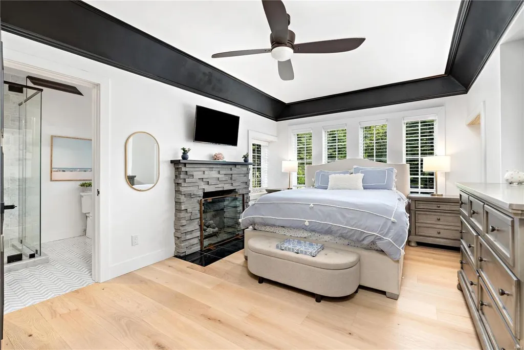 9948 Litzsinger Road Home in Saint Louis, Missouri. Step into the timeless charm of Galloway Manor, a beautifully renovated Tudor estate that seamlessly blends historic character with modern luxury. Enjoy stunning entertaining spaces, a designer kitchen, a courtyard terrace overlooking the pool and tennis court, a main floor primary suite with a showstopping walk-in closet, and much more. 