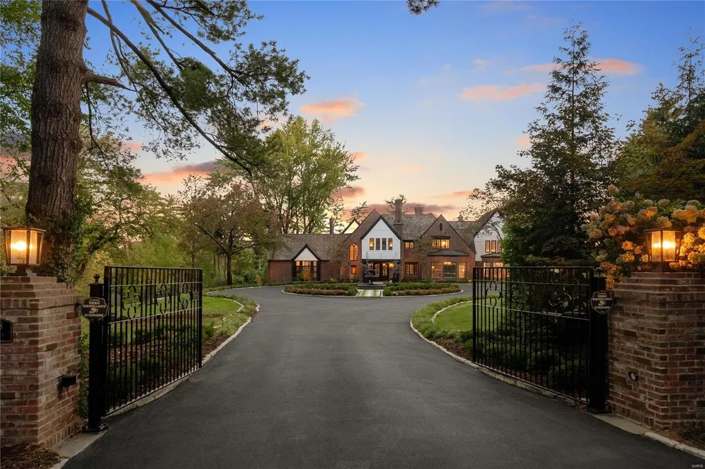 9948 Litzsinger Road Home in Saint Louis, Missouri. Step into the timeless charm of Galloway Manor, a beautifully renovated Tudor estate that seamlessly blends historic character with modern luxury. Enjoy stunning entertaining spaces, a designer kitchen, a courtyard terrace overlooking the pool and tennis court, a main floor primary suite with a showstopping walk-in closet, and much more. 