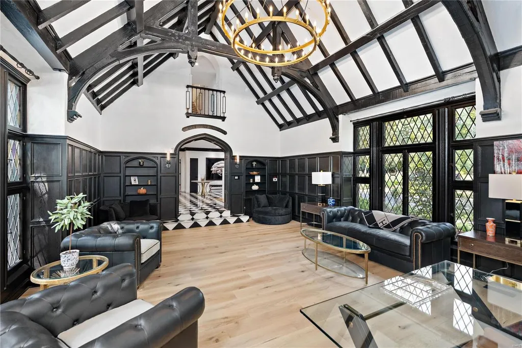 9948 Litzsinger Road Home in Saint Louis, Missouri. Step into the timeless charm of Galloway Manor, a beautifully renovated Tudor estate that seamlessly blends historic character with modern luxury. Enjoy stunning entertaining spaces, a designer kitchen, a courtyard terrace overlooking the pool and tennis court, a main floor primary suite with a showstopping walk-in closet, and much more. 