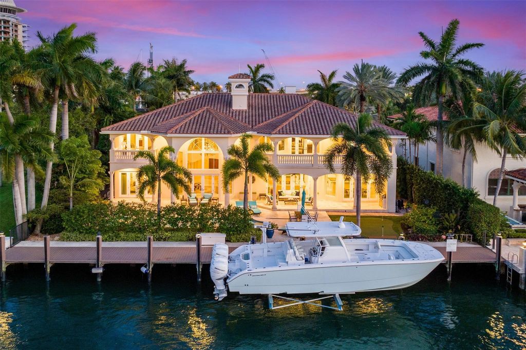 Discover the epitome of waterfront luxury living at 2521 Mercedes Dr, Fort Lauderdale, FL. Nestled in the prestigious Harbor Beach gated community, this 7-bed, 8-bath estate boasts 7,484 square feet of exquisite design.