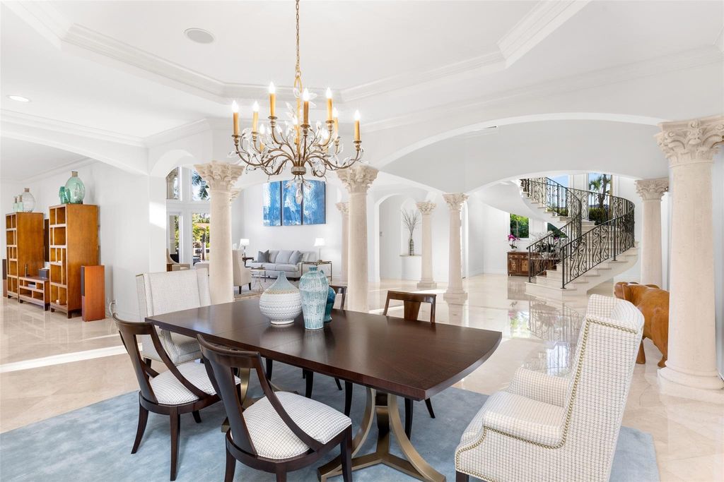 Discover the epitome of waterfront luxury living at 2521 Mercedes Dr, Fort Lauderdale, FL. Nestled in the prestigious Harbor Beach gated community, this 7-bed, 8-bath estate boasts 7,484 square feet of exquisite design.