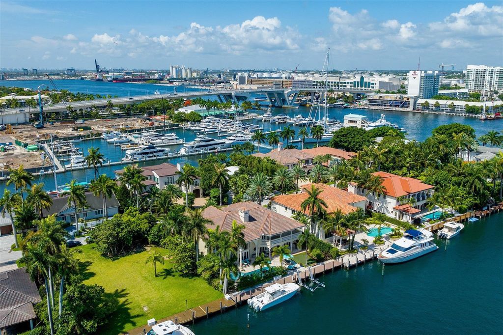 Discover the epitome of waterfront luxury living at 2521 Mercedes Dr, Fort Lauderdale, FL. Nestled in the prestigious Harbor Beach gated community, this 7-bed, 8-bath estate boasts 7,484 square feet of exquisite design.