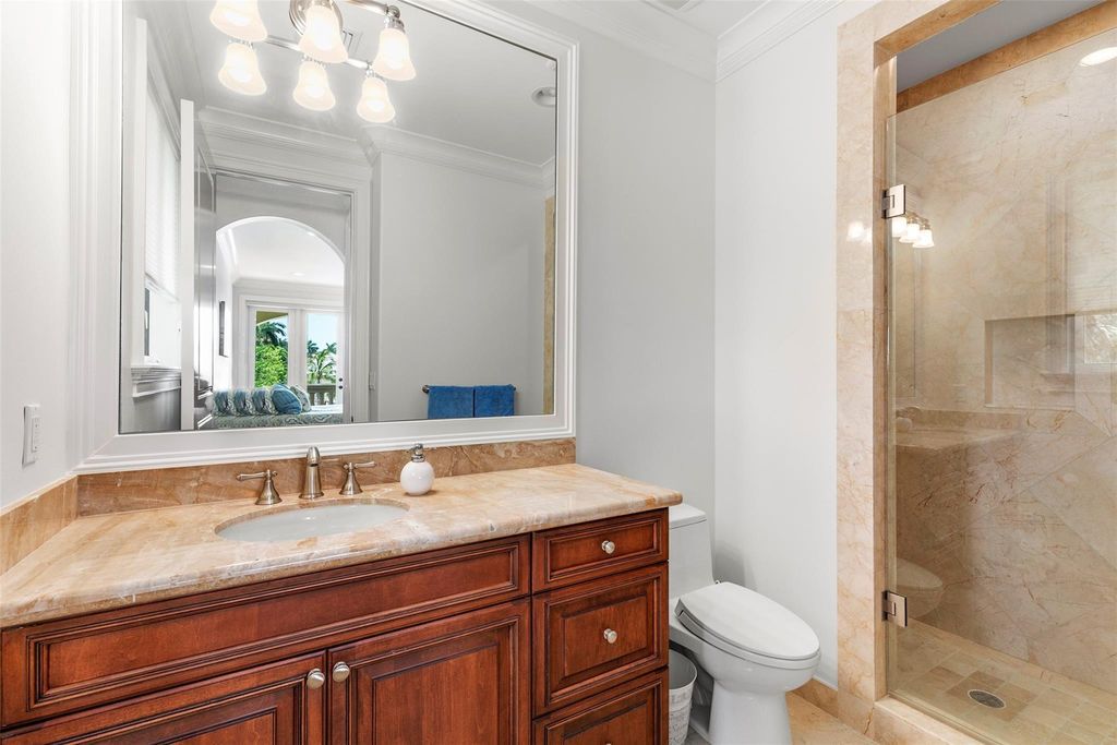 Discover the epitome of waterfront luxury living at 2521 Mercedes Dr, Fort Lauderdale, FL. Nestled in the prestigious Harbor Beach gated community, this 7-bed, 8-bath estate boasts 7,484 square feet of exquisite design.