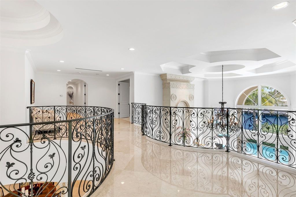 Discover the epitome of waterfront luxury living at 2521 Mercedes Dr, Fort Lauderdale, FL. Nestled in the prestigious Harbor Beach gated community, this 7-bed, 8-bath estate boasts 7,484 square feet of exquisite design.