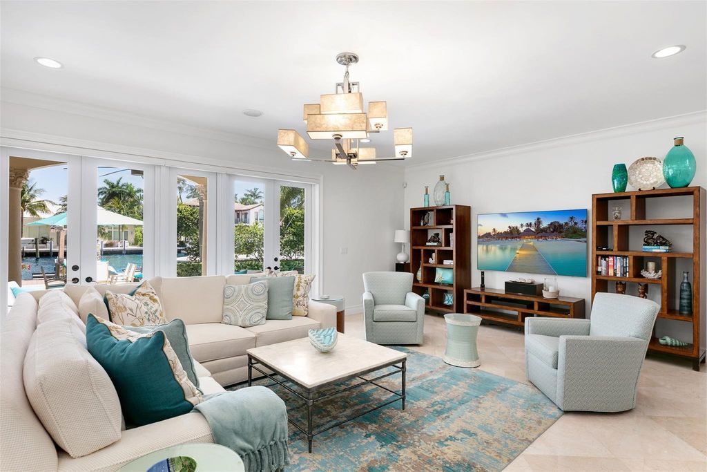 Discover the epitome of waterfront luxury living at 2521 Mercedes Dr, Fort Lauderdale, FL. Nestled in the prestigious Harbor Beach gated community, this 7-bed, 8-bath estate boasts 7,484 square feet of exquisite design.