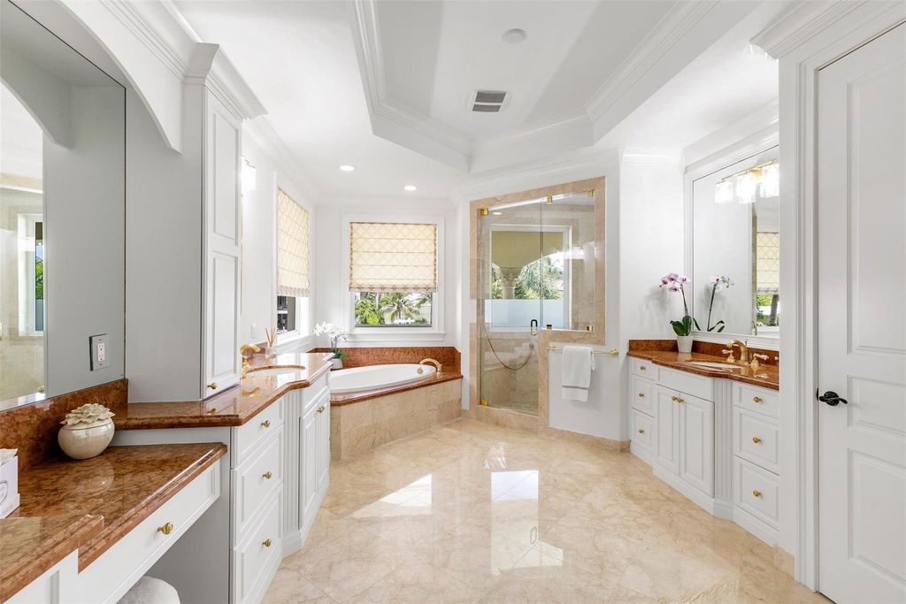 Discover the epitome of waterfront luxury living at 2521 Mercedes Dr, Fort Lauderdale, FL. Nestled in the prestigious Harbor Beach gated community, this 7-bed, 8-bath estate boasts 7,484 square feet of exquisite design.