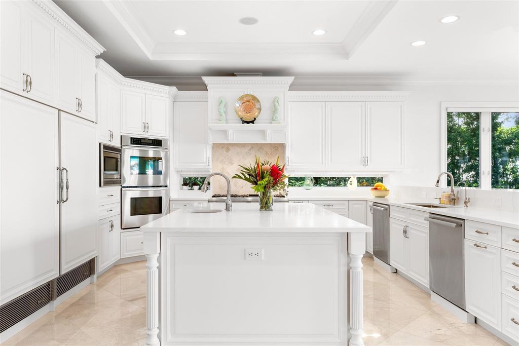 Discover the epitome of waterfront luxury living at 2521 Mercedes Dr, Fort Lauderdale, FL. Nestled in the prestigious Harbor Beach gated community, this 7-bed, 8-bath estate boasts 7,484 square feet of exquisite design.