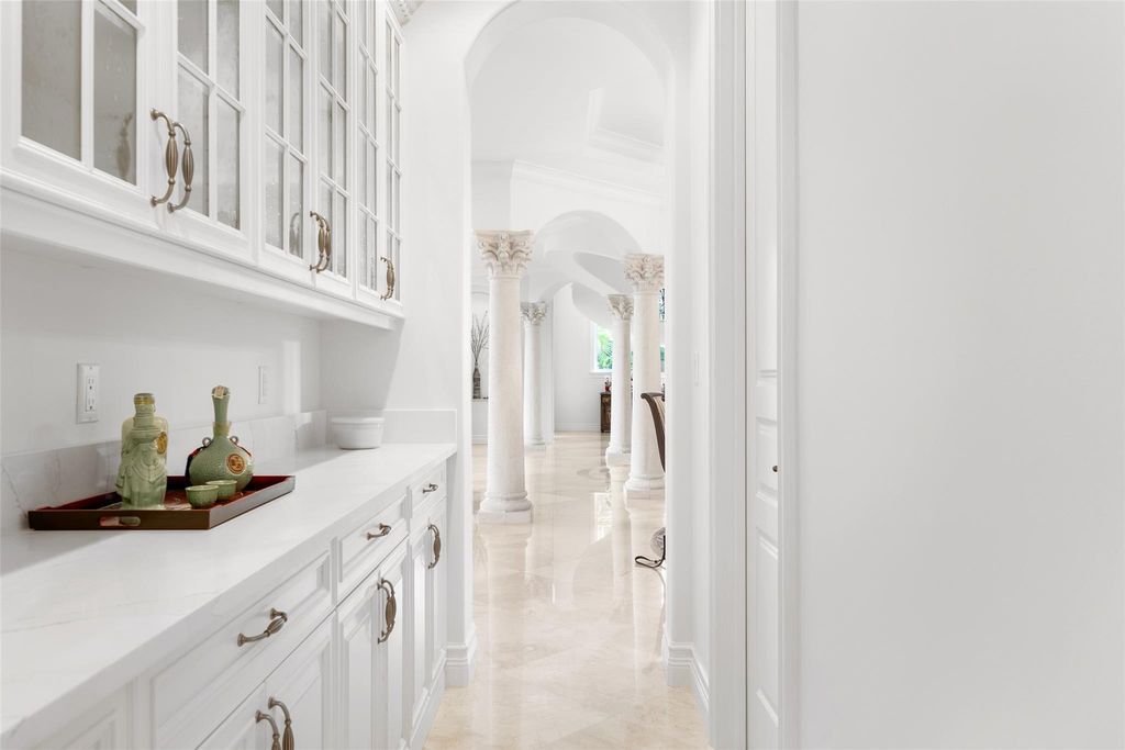 Discover the epitome of waterfront luxury living at 2521 Mercedes Dr, Fort Lauderdale, FL. Nestled in the prestigious Harbor Beach gated community, this 7-bed, 8-bath estate boasts 7,484 square feet of exquisite design.