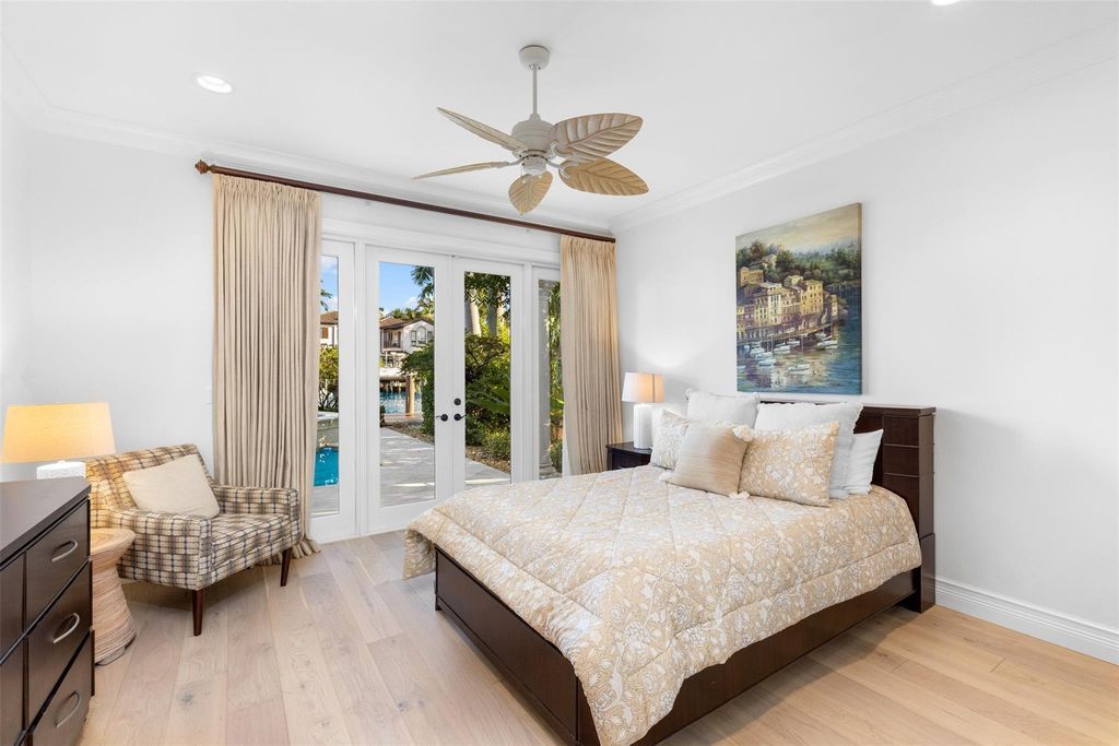 Discover the epitome of waterfront luxury living at 2521 Mercedes Dr, Fort Lauderdale, FL. Nestled in the prestigious Harbor Beach gated community, this 7-bed, 8-bath estate boasts 7,484 square feet of exquisite design.
