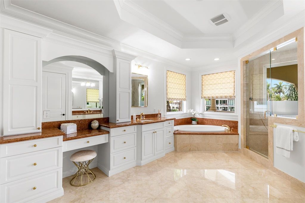 Discover the epitome of waterfront luxury living at 2521 Mercedes Dr, Fort Lauderdale, FL. Nestled in the prestigious Harbor Beach gated community, this 7-bed, 8-bath estate boasts 7,484 square feet of exquisite design.
