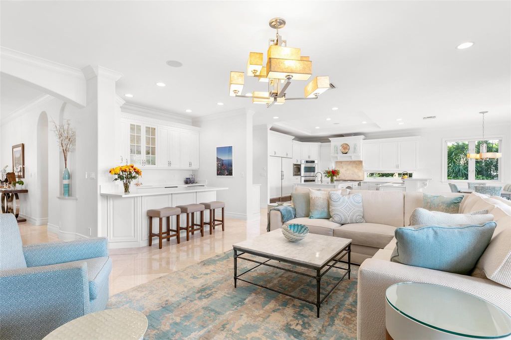 Discover the epitome of waterfront luxury living at 2521 Mercedes Dr, Fort Lauderdale, FL. Nestled in the prestigious Harbor Beach gated community, this 7-bed, 8-bath estate boasts 7,484 square feet of exquisite design.