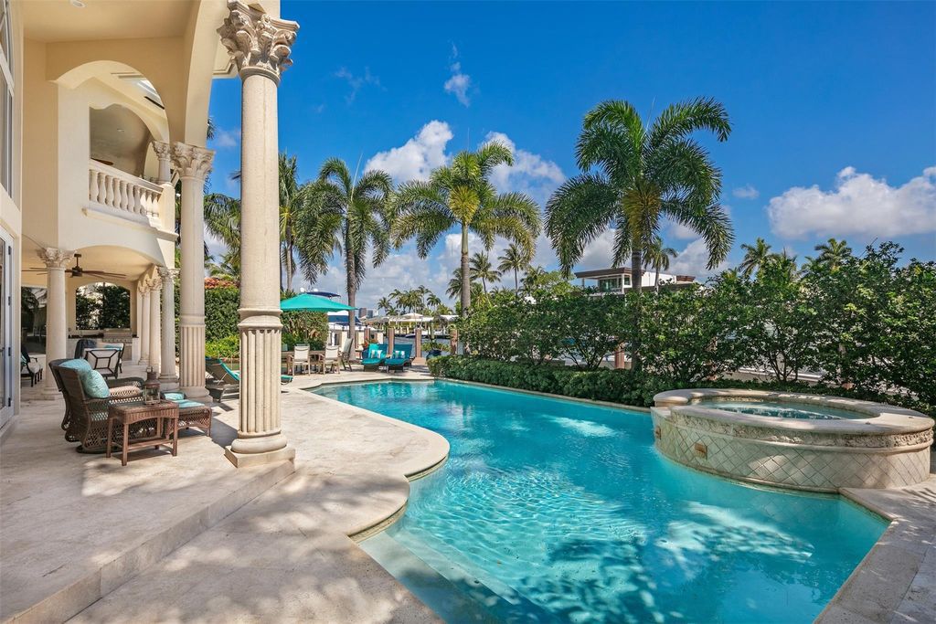Discover the epitome of waterfront luxury living at 2521 Mercedes Dr, Fort Lauderdale, FL. Nestled in the prestigious Harbor Beach gated community, this 7-bed, 8-bath estate boasts 7,484 square feet of exquisite design.