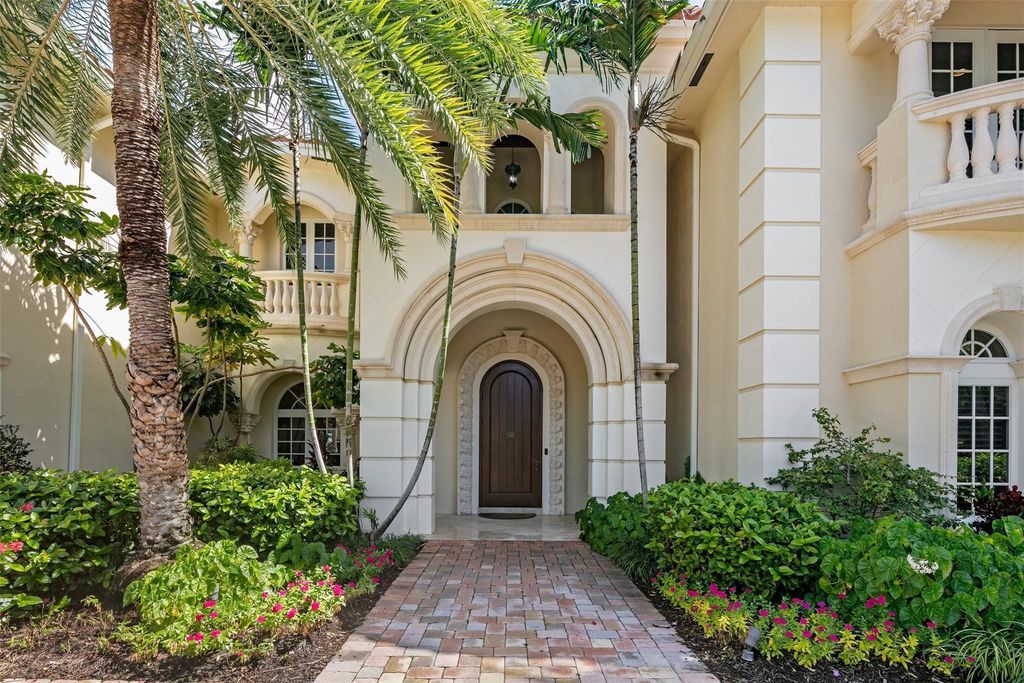 Discover the epitome of waterfront luxury living at 2521 Mercedes Dr, Fort Lauderdale, FL. Nestled in the prestigious Harbor Beach gated community, this 7-bed, 8-bath estate boasts 7,484 square feet of exquisite design.