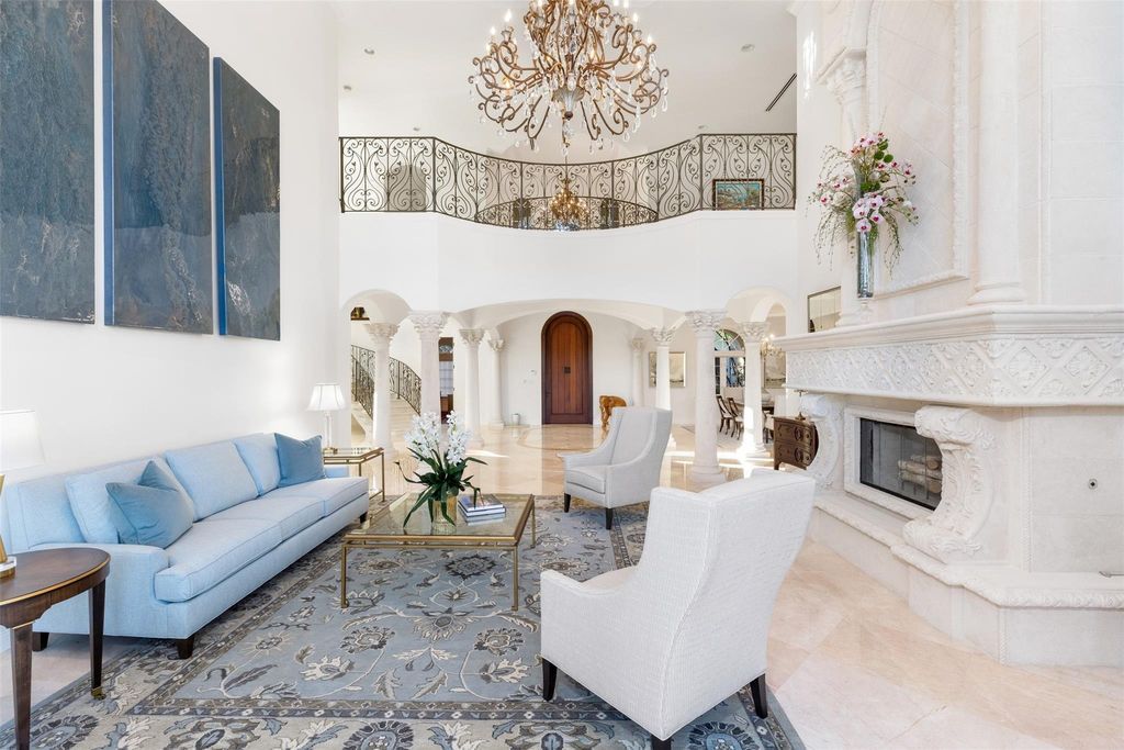Discover the epitome of waterfront luxury living at 2521 Mercedes Dr, Fort Lauderdale, FL. Nestled in the prestigious Harbor Beach gated community, this 7-bed, 8-bath estate boasts 7,484 square feet of exquisite design.