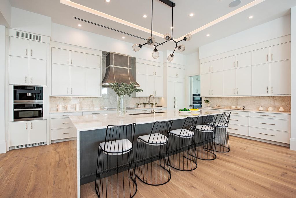 Nestled in the heart of Naples, Florida, 722 16th Ave S embodies the epitome of modern coastal living, seamlessly blending casual elegance with contemporary design. Boasting 5 bedrooms, 7 baths, and 6,224 square feet of living space, this newly constructed masterpiece, meticulously crafted by Falcon Design Inc., BBA Development Inc., and NP Interior Design