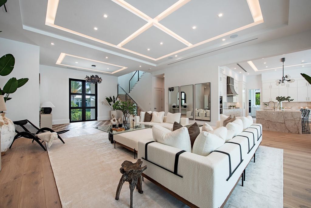 Nestled in the heart of Naples, Florida, 722 16th Ave S embodies the epitome of modern coastal living, seamlessly blending casual elegance with contemporary design. Boasting 5 bedrooms, 7 baths, and 6,224 square feet of living space, this newly constructed masterpiece, meticulously crafted by Falcon Design Inc., BBA Development Inc., and NP Interior Design