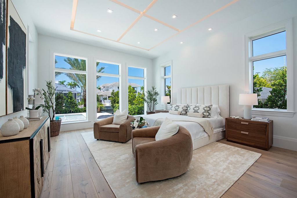 Nestled in the heart of Naples, Florida, 722 16th Ave S embodies the epitome of modern coastal living, seamlessly blending casual elegance with contemporary design. Boasting 5 bedrooms, 7 baths, and 6,224 square feet of living space, this newly constructed masterpiece, meticulously crafted by Falcon Design Inc., BBA Development Inc., and NP Interior Design