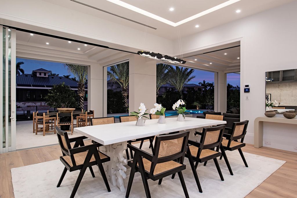 Nestled in the heart of Naples, Florida, 722 16th Ave S embodies the epitome of modern coastal living, seamlessly blending casual elegance with contemporary design. Boasting 5 bedrooms, 7 baths, and 6,224 square feet of living space, this newly constructed masterpiece, meticulously crafted by Falcon Design Inc., BBA Development Inc., and NP Interior Design