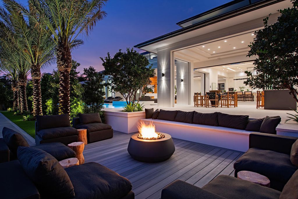 Nestled in the heart of Naples, Florida, 722 16th Ave S embodies the epitome of modern coastal living, seamlessly blending casual elegance with contemporary design. Boasting 5 bedrooms, 7 baths, and 6,224 square feet of living space, this newly constructed masterpiece, meticulously crafted by Falcon Design Inc., BBA Development Inc., and NP Interior Design