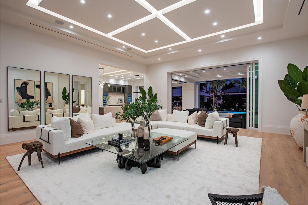Nestled in the heart of Naples, Florida, 722 16th Ave S embodies the epitome of modern coastal living, seamlessly blending casual elegance with contemporary design. Boasting 5 bedrooms, 7 baths, and 6,224 square feet of living space, this newly constructed masterpiece, meticulously crafted by Falcon Design Inc., BBA Development Inc., and NP Interior Design