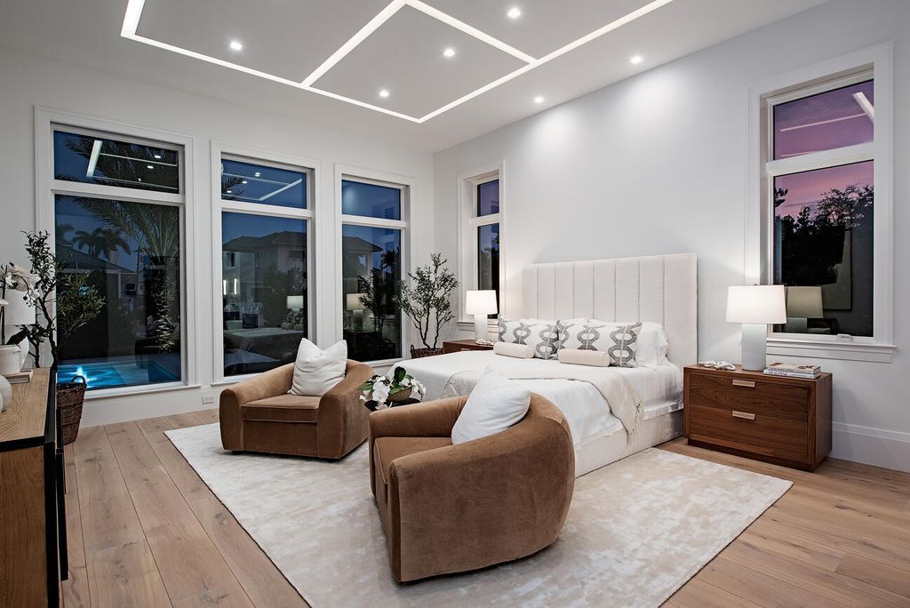 Nestled in the heart of Naples, Florida, 722 16th Ave S embodies the epitome of modern coastal living, seamlessly blending casual elegance with contemporary design. Boasting 5 bedrooms, 7 baths, and 6,224 square feet of living space, this newly constructed masterpiece, meticulously crafted by Falcon Design Inc., BBA Development Inc., and NP Interior Design