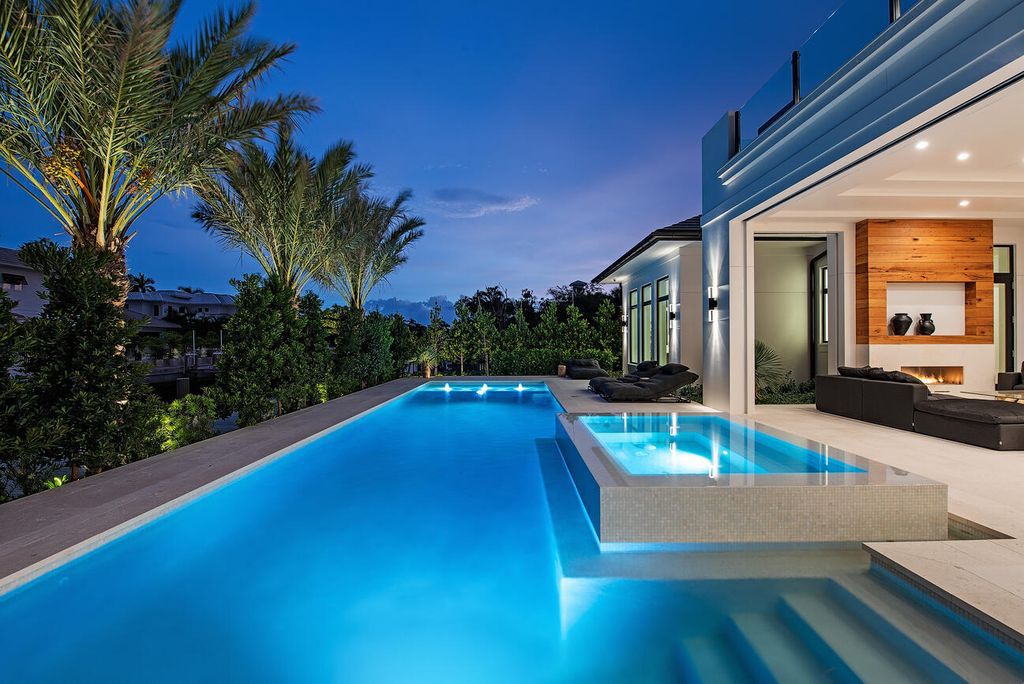 Nestled in the heart of Naples, Florida, 722 16th Ave S embodies the epitome of modern coastal living, seamlessly blending casual elegance with contemporary design. Boasting 5 bedrooms, 7 baths, and 6,224 square feet of living space, this newly constructed masterpiece, meticulously crafted by Falcon Design Inc., BBA Development Inc., and NP Interior Design